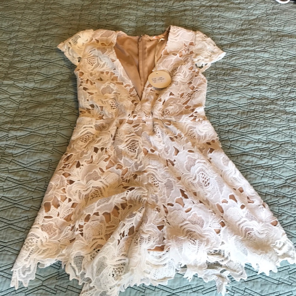 White and nude romper